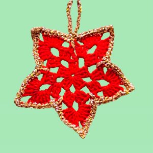 Etoile rouge au bord doré