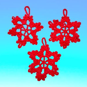 Lot de 3 flocons rouges au crochet amidonnés